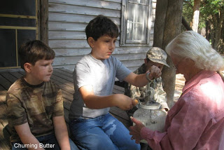 churning butter on a homeschool field trip