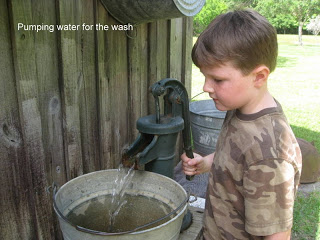 pumping water on a homeschool field trip