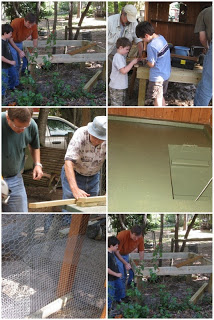 family building a chicken coop together