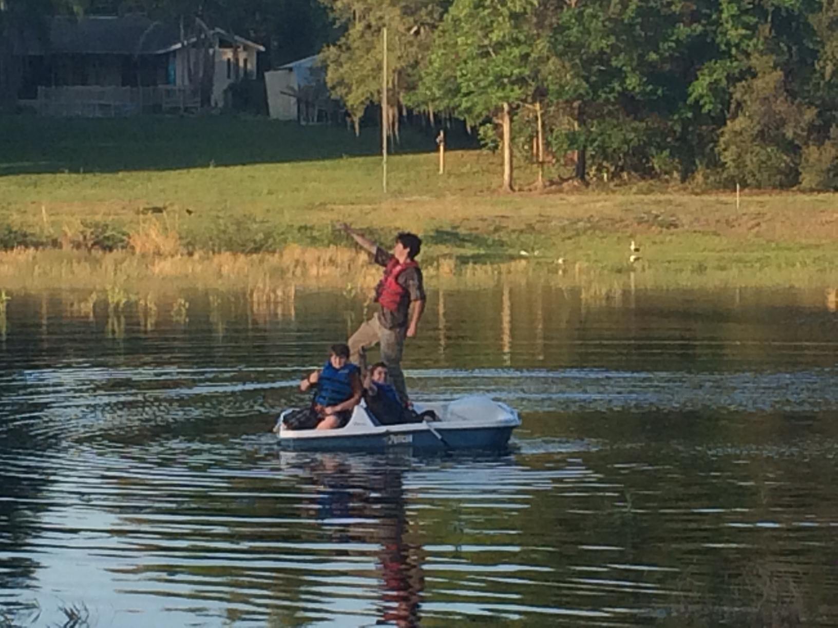 boys boating on lake homeschooling