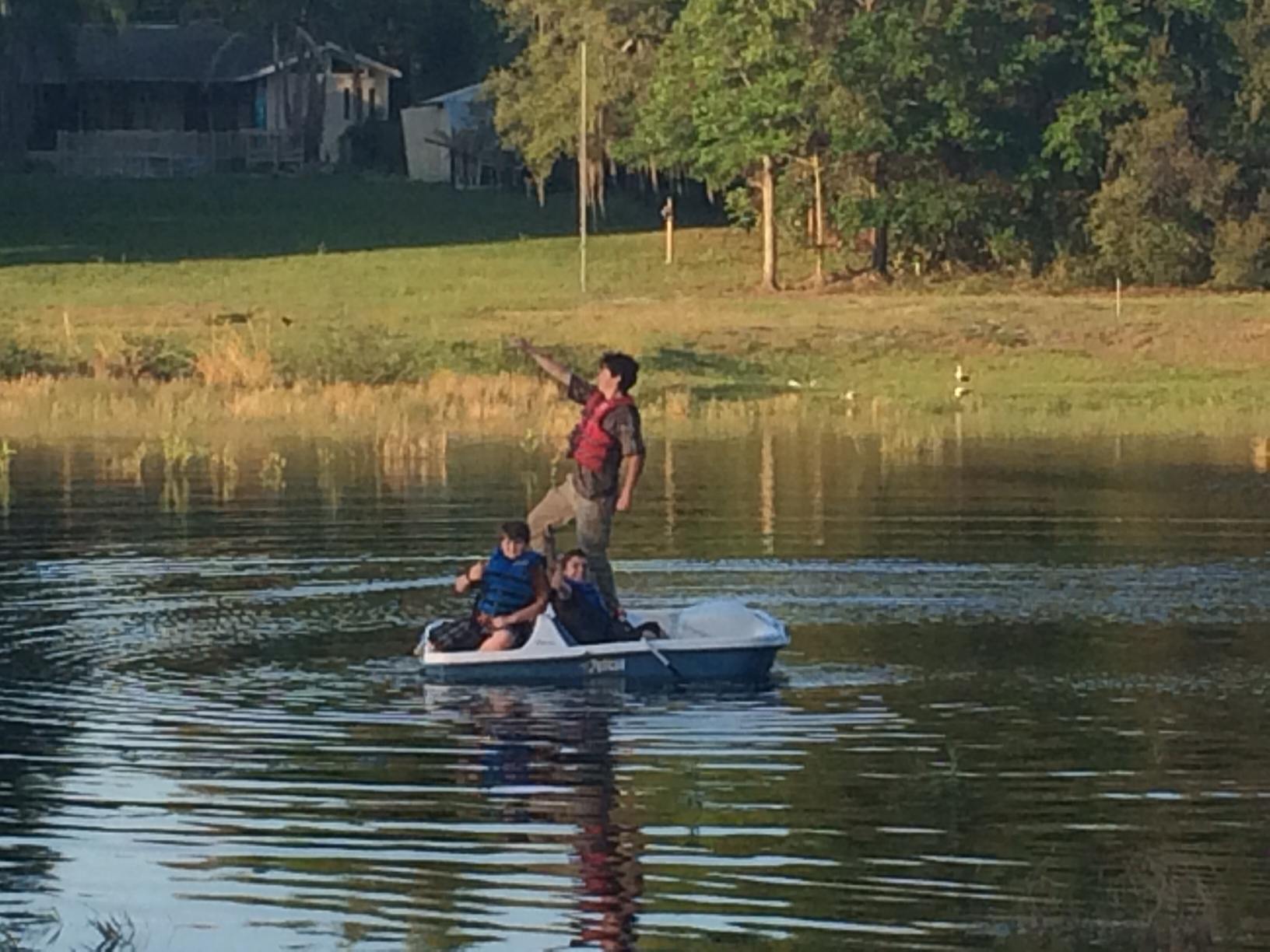 boys boating on lake homeschooling